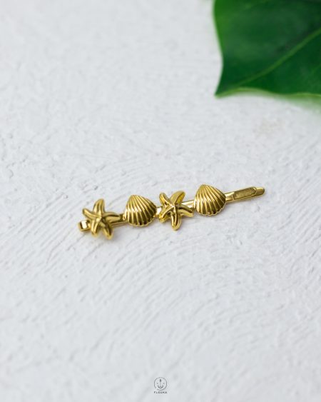 gold seashell and seastar tokka