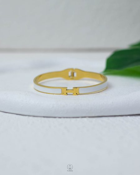 litter H white & gold bracelet