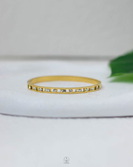 white struas gold bracelet