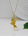 gold bird necklace