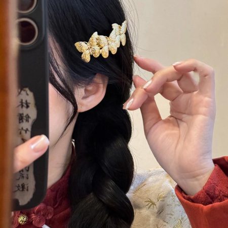 triple gold butterfly toka