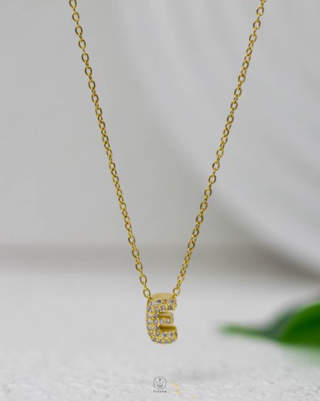 litter E gold strus necklace