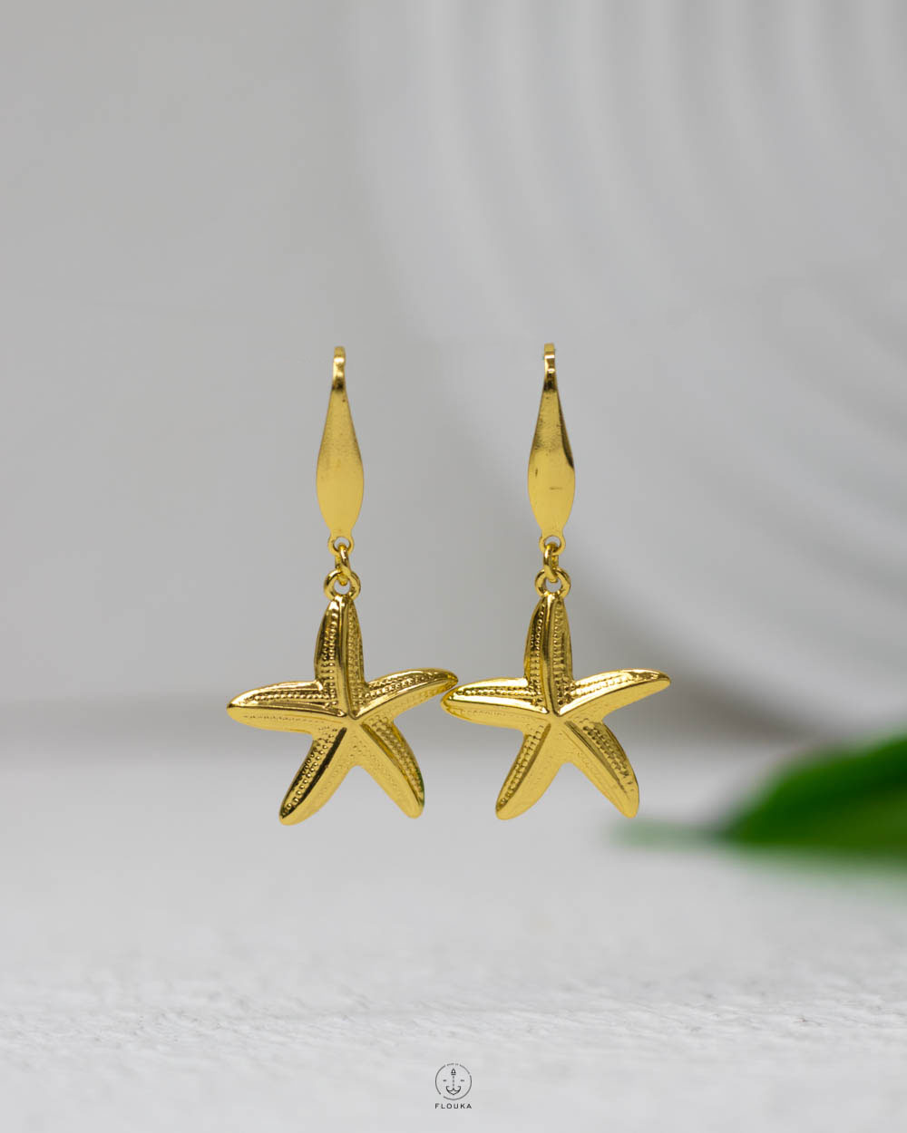 1752970896_e0614.jpg gold seastar earring