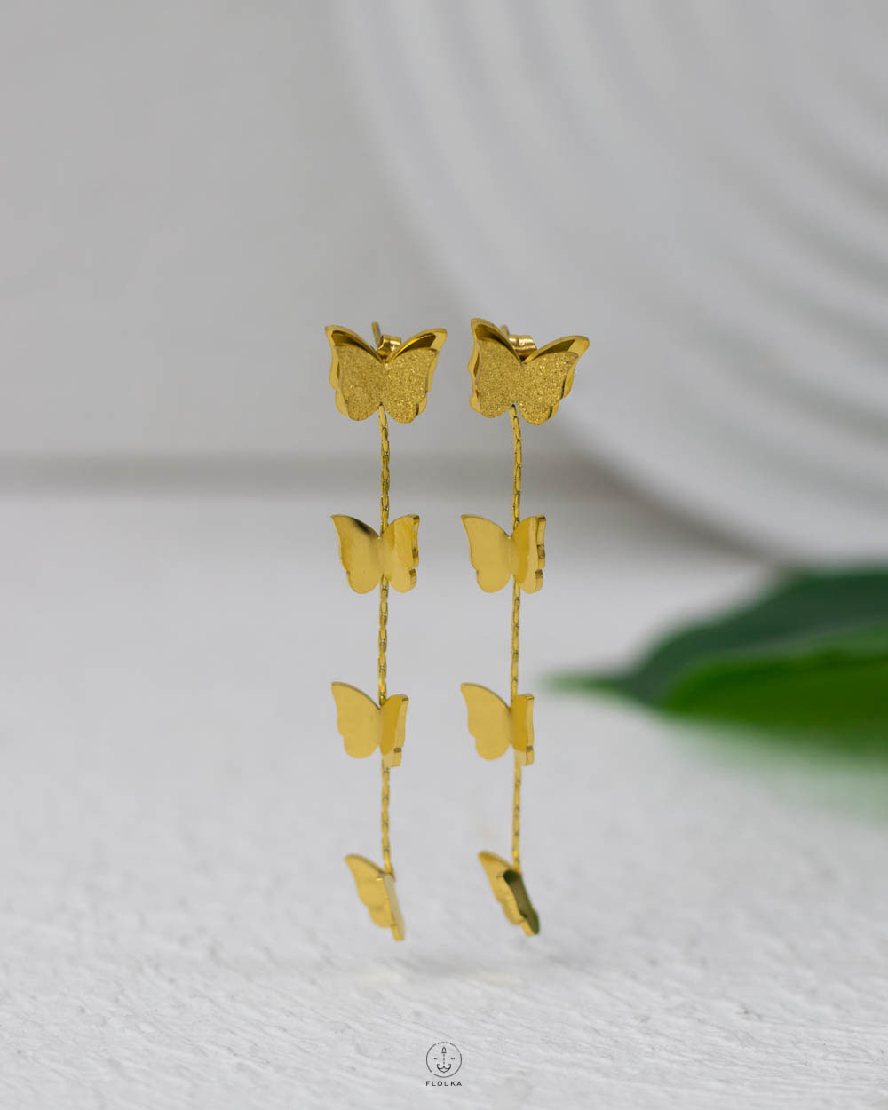 1752971051_e0612.jpg many basic butterfly earrings