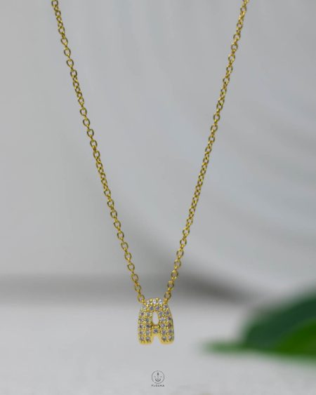 litter A gold straus necklace