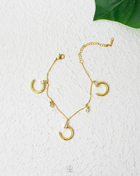 white strues gold nail necklace