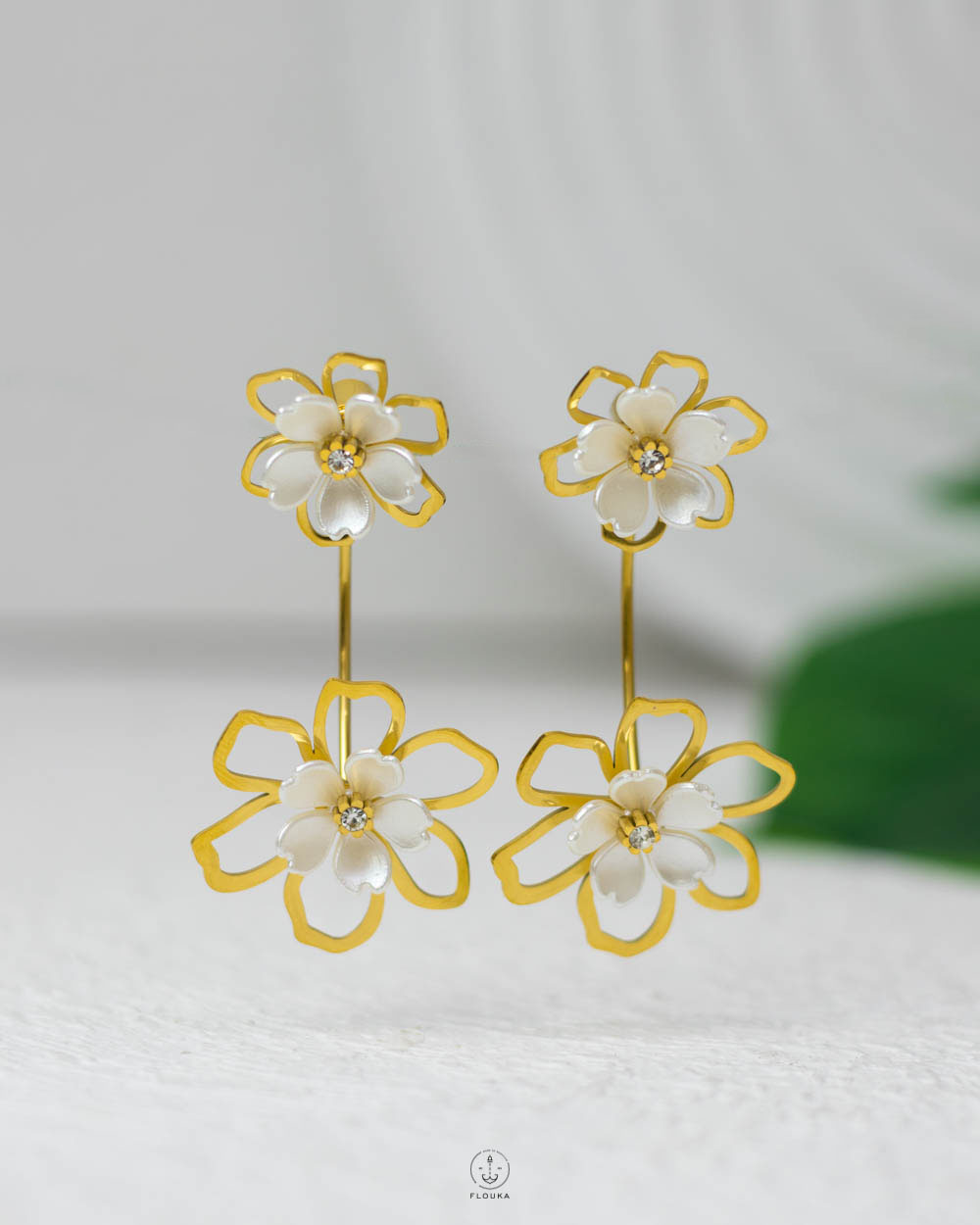 1753887397_E0681.jpg double white & gold rose earring