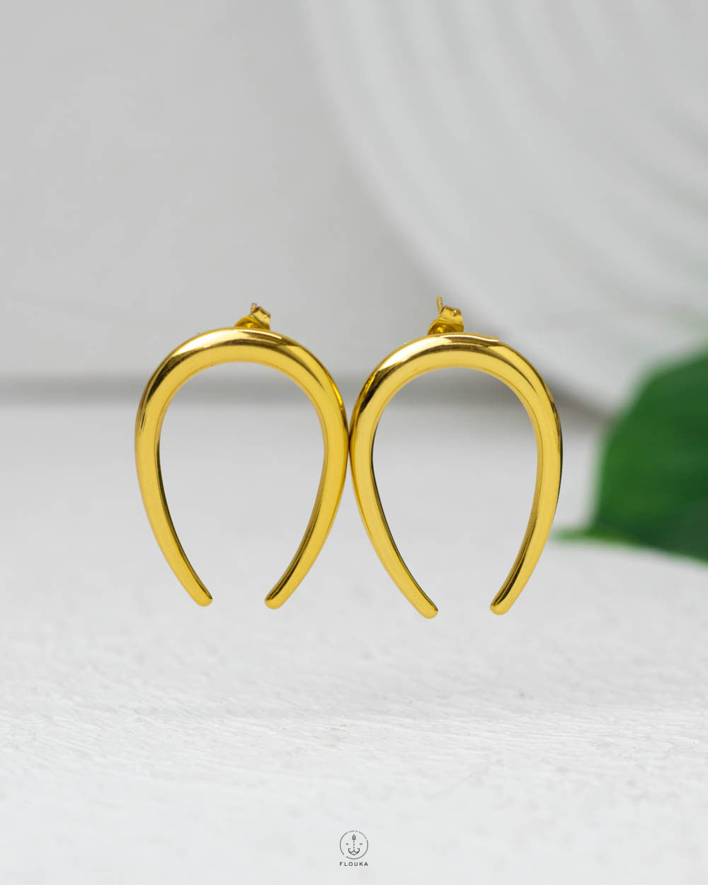 1753887672_E0682.jpg gold Horseshoe earring