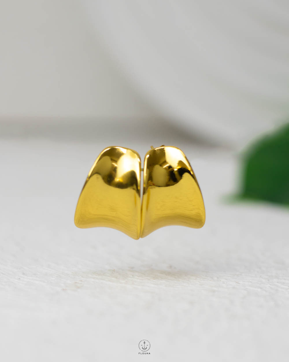 1753888099_E0683.jpg gold curve earring
