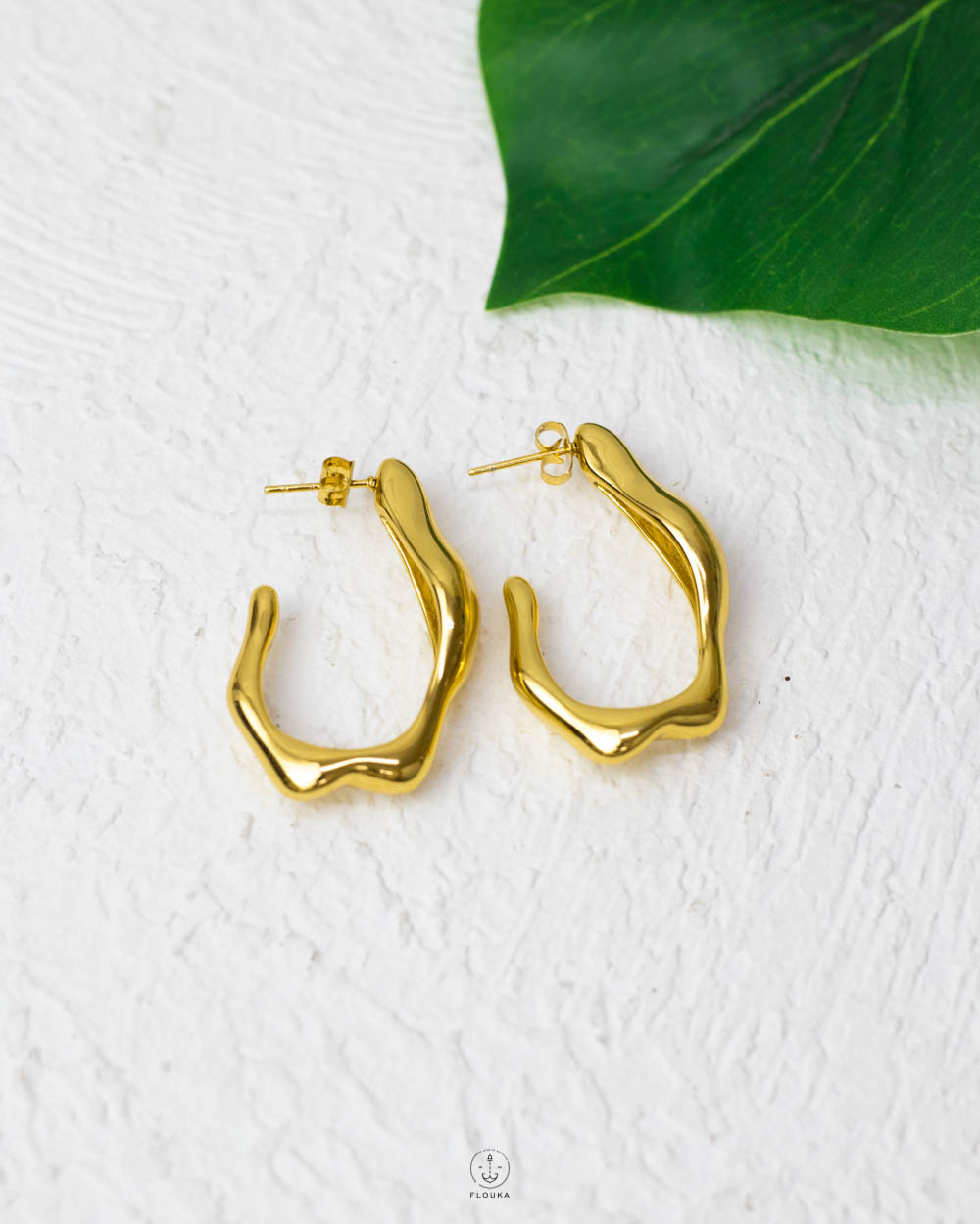 1753889060_E0686.jpg gold wavy earring