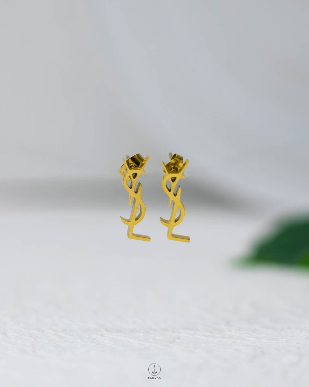 1755298062_e0722.jpg gold YSL earrings