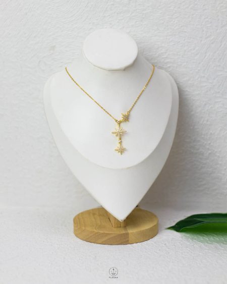 triple gold space star necklace