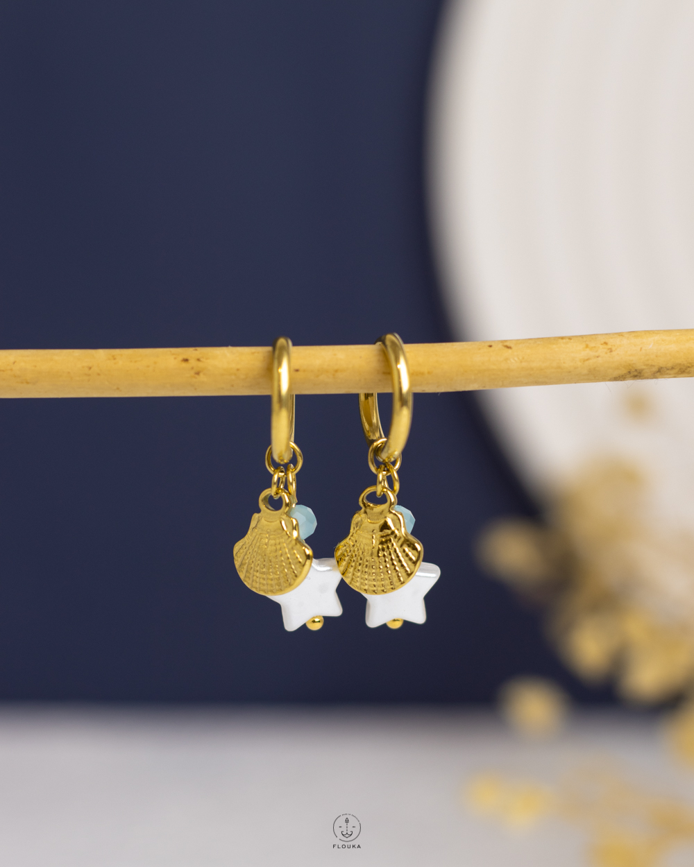 1757469107_e0768.jpg gold seashell & white star earring