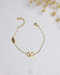 tiny gold valentino bracelet