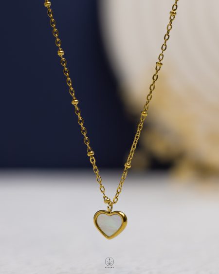 white rasin heart gold necklace