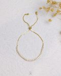 tiny free size gold tennis bracelet