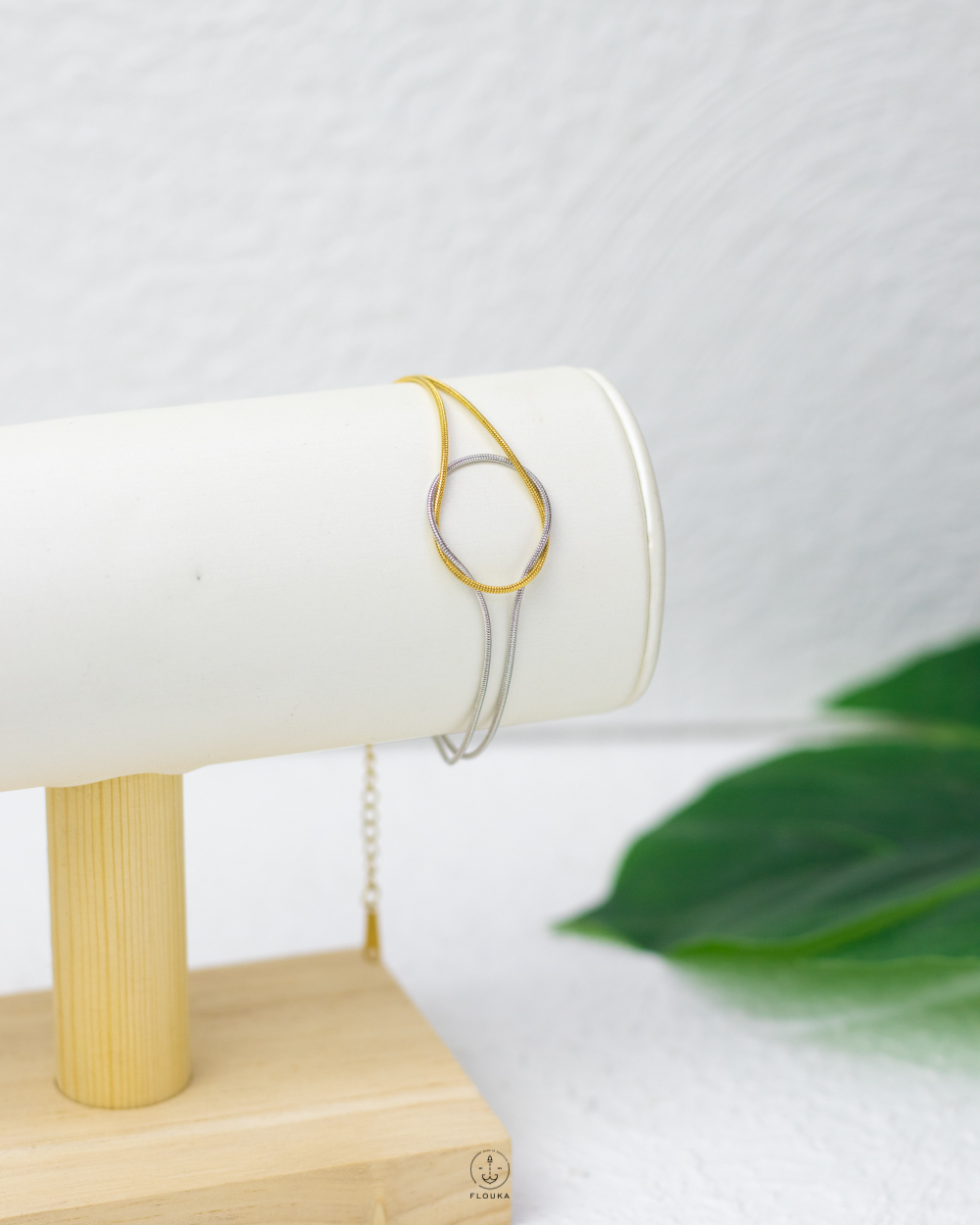 1758416365_b1105.jpg gold & silver tie bracelet