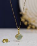 gold & baby blue necklace