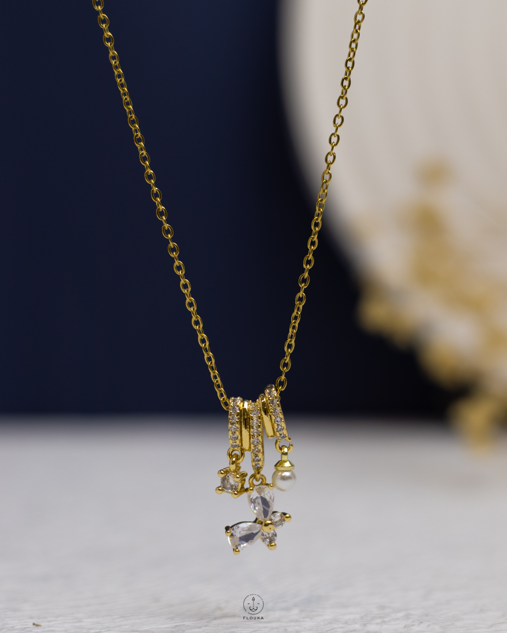 1758672292_n1937.jpg white struas butterfly gold necklace