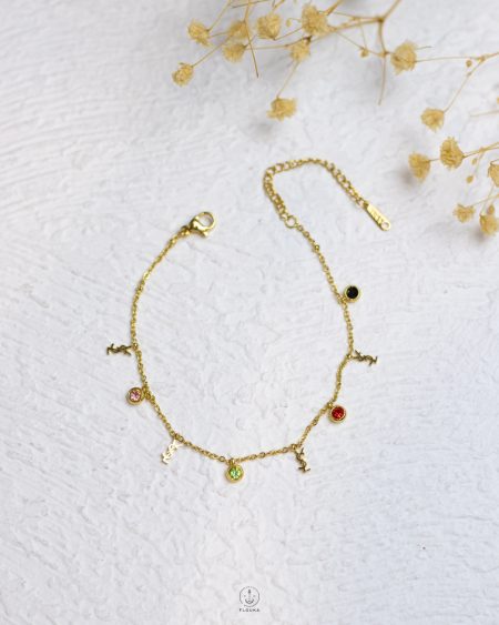 gold YSL struas anklet