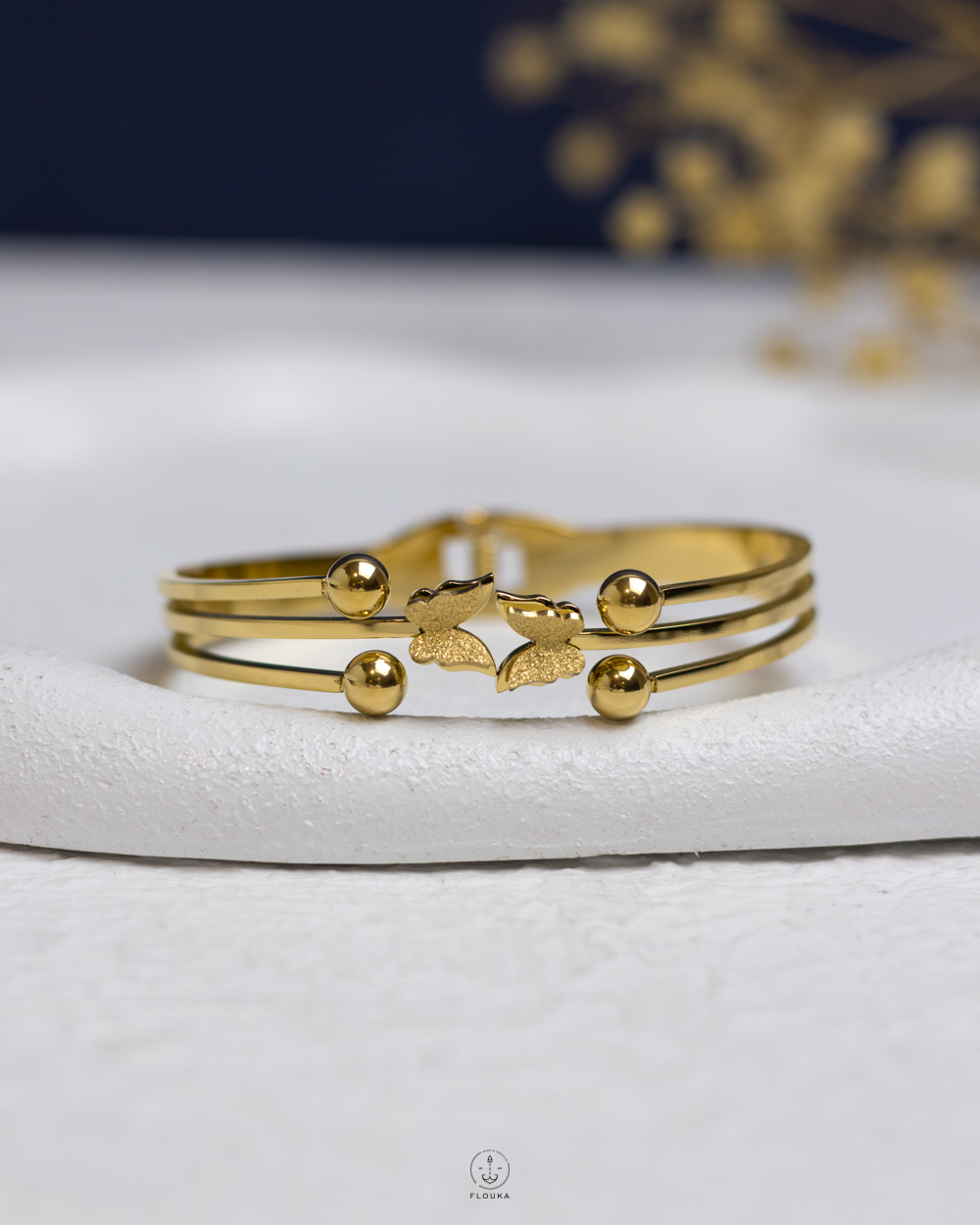 1759253786_o0979.jpg double butterfly gold bracelet