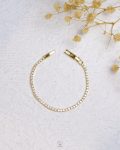 tiny gold tennis bracelet