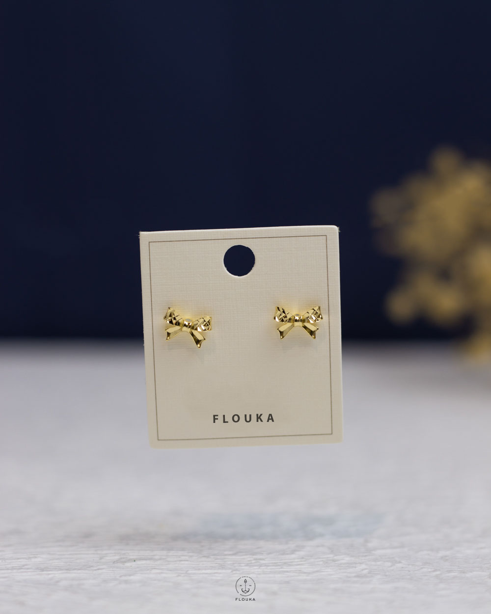 1759418872_e0832.jpg gold tiny tie earring