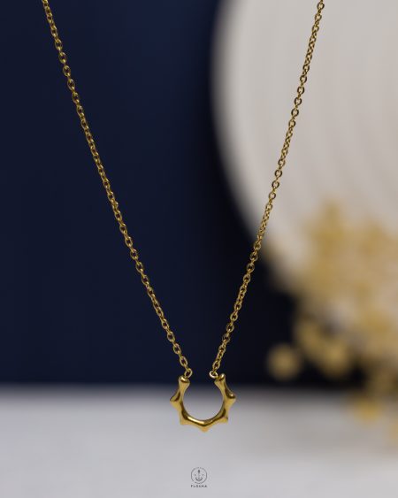 gold clow necklace