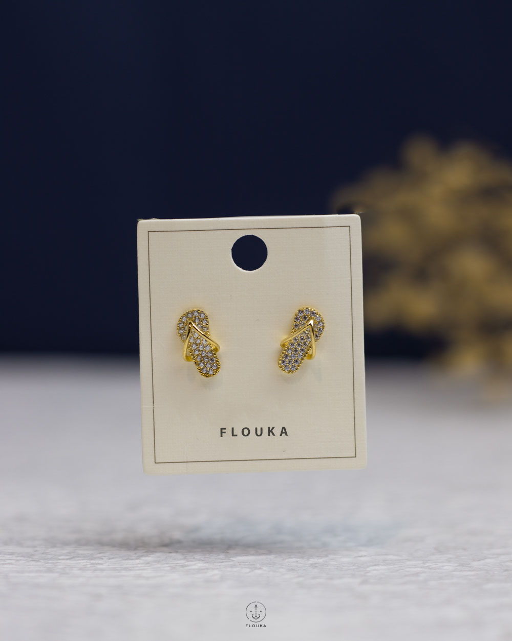 1759512575_e0831.jpg white struas slipper gold earring