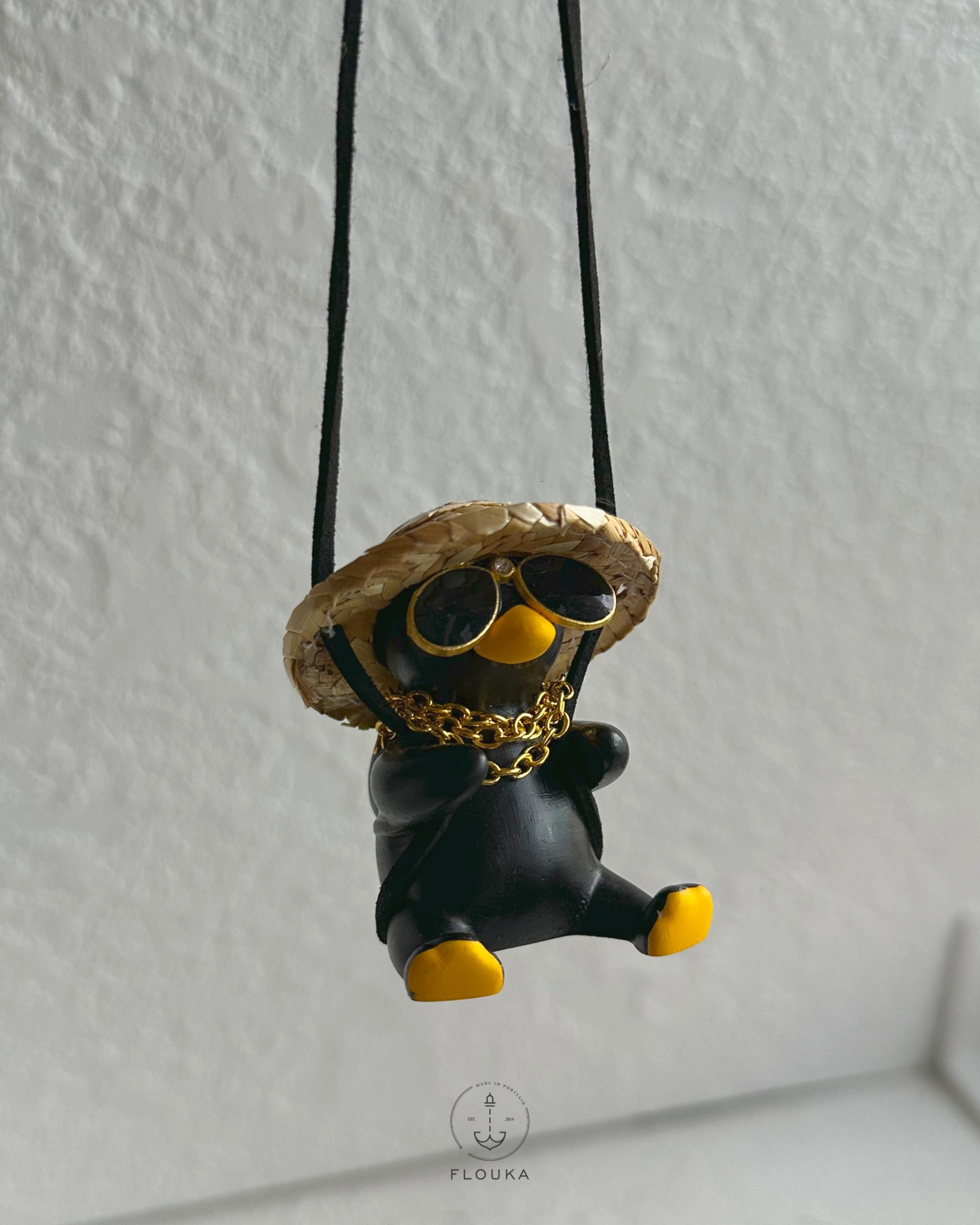 1759586640_photo-output.jpeg black Duck carholder