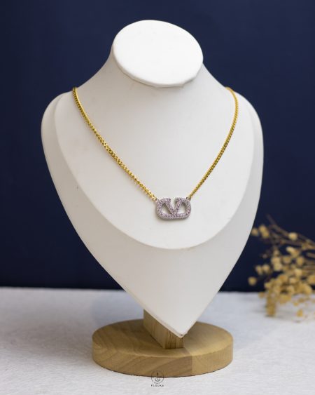 silver struas valentino gold necklace