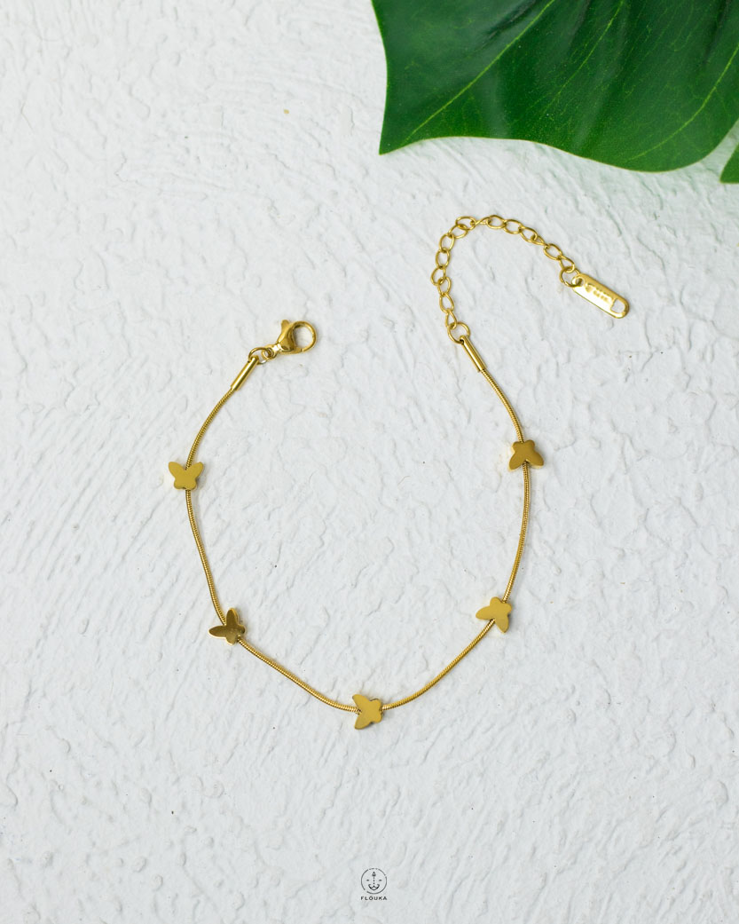 1759881474_v.jpg balls and butterfly bracelet