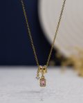 pink struas gold necklace