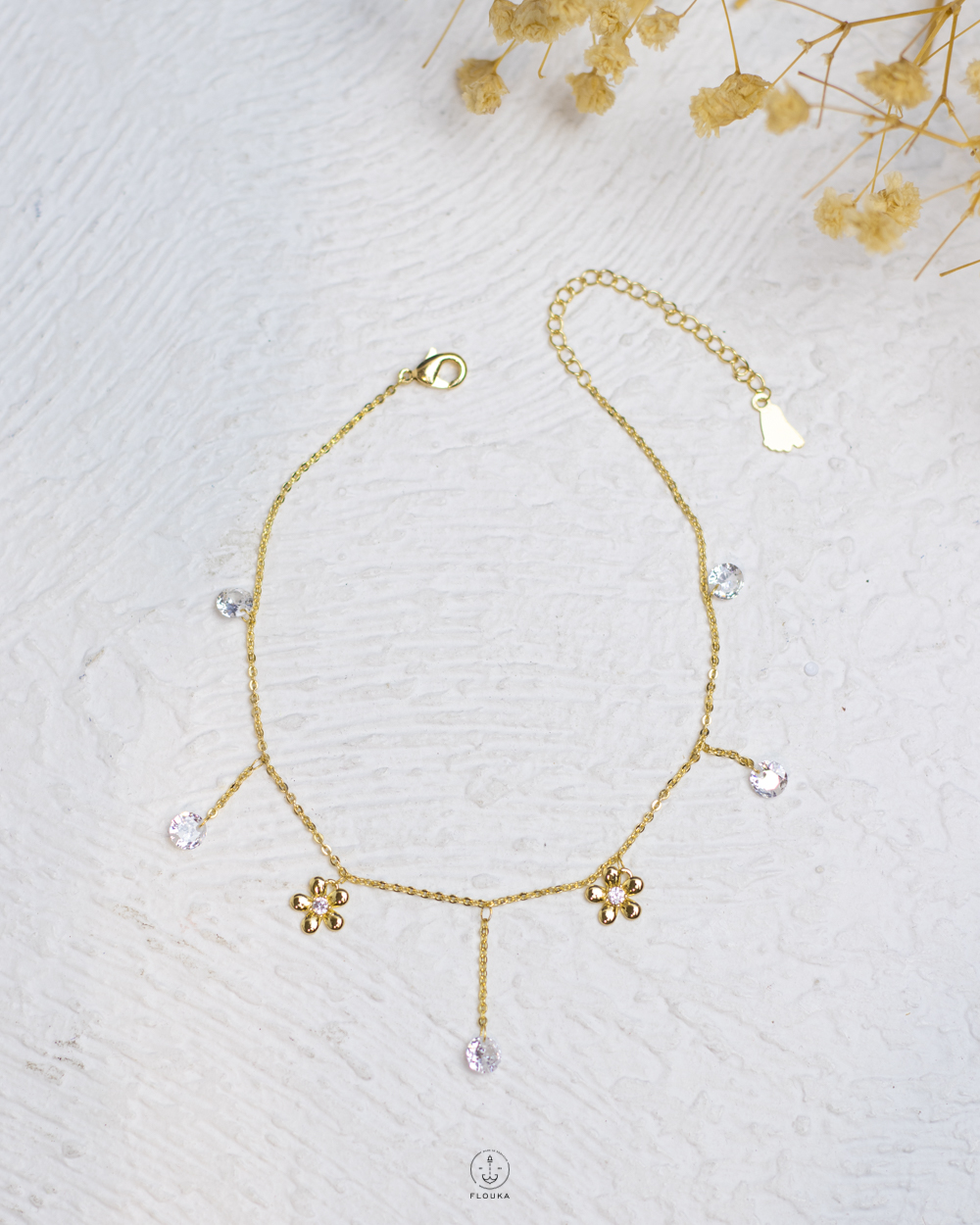 1761250256_a0200.jpg white struas gold flower anklet