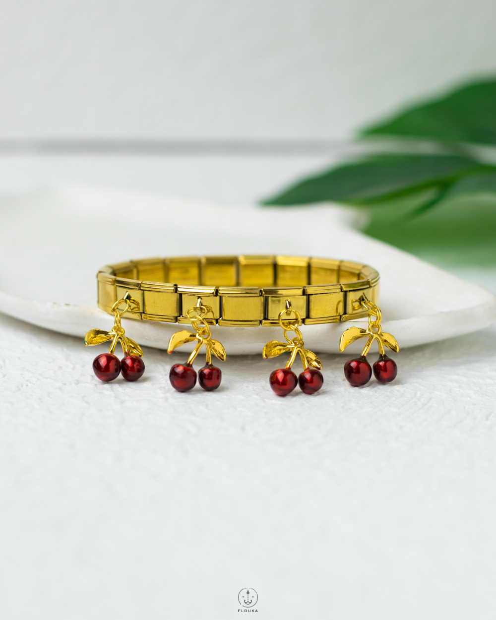 1761513018_o0995.jpg cherry astec gold bracelet