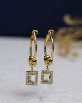 white strays gold earrings