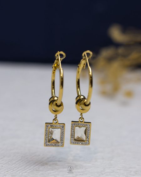 white strays gold earrings