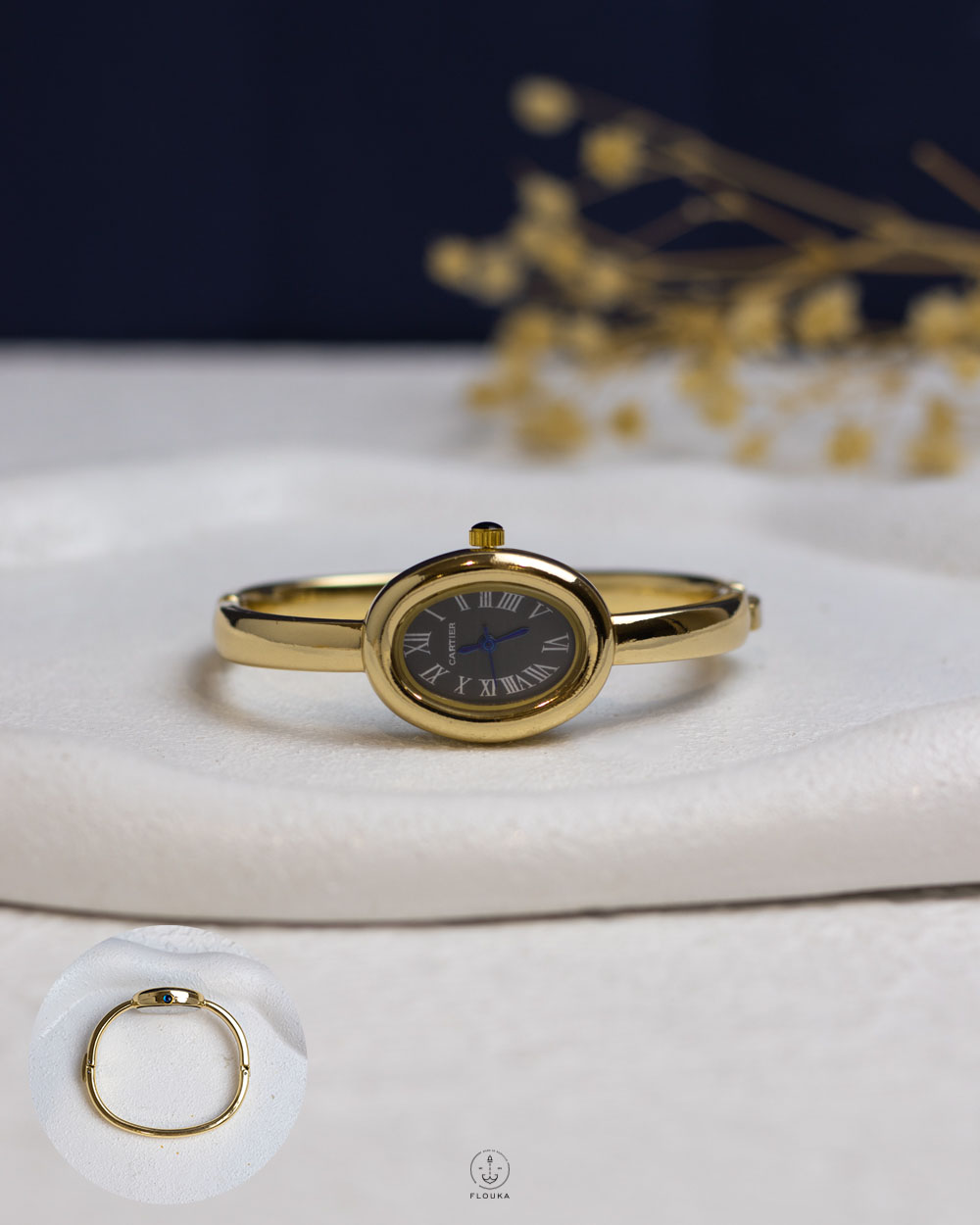 1761694721_o1000.jpg gold & black watch bracelet