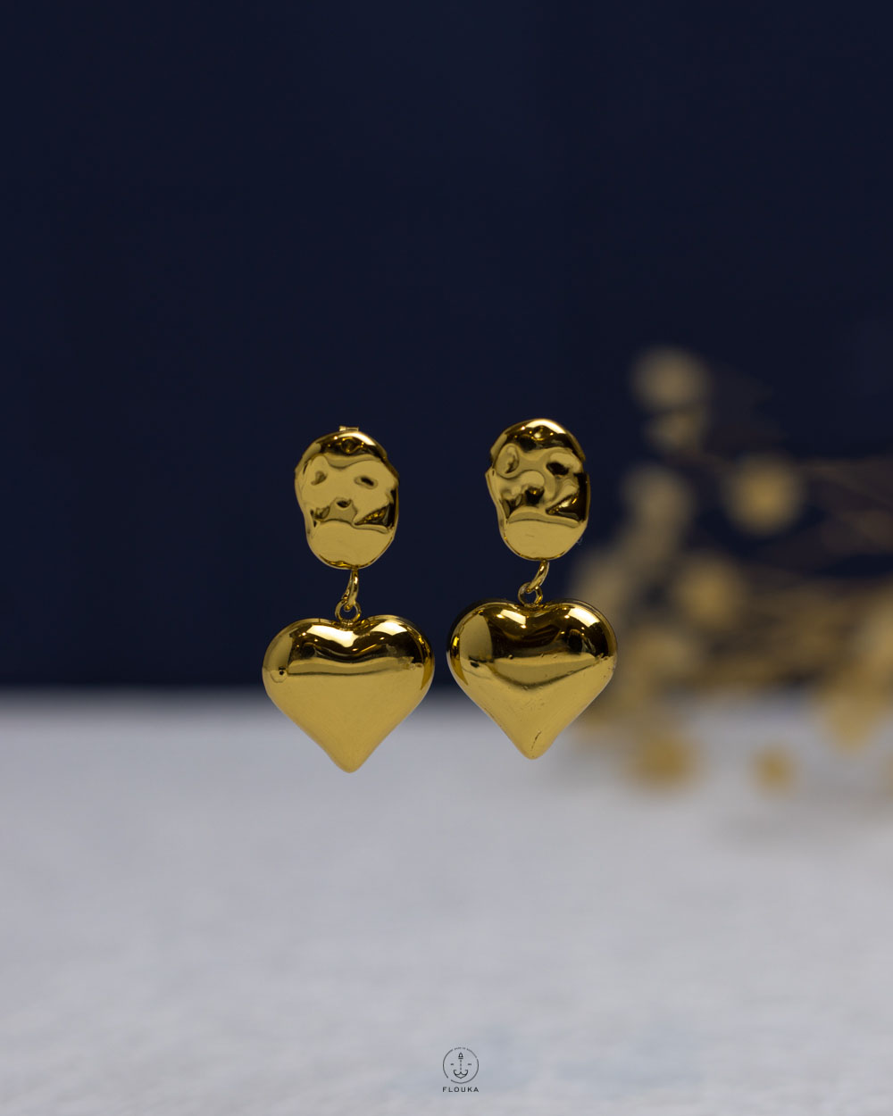 1761779646_e0880.jpg gold heart earring