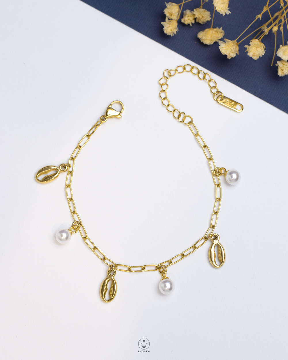 1762278124_b1156.jpg white bead gold seashell bracelet