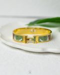 green hermes gold bracelet