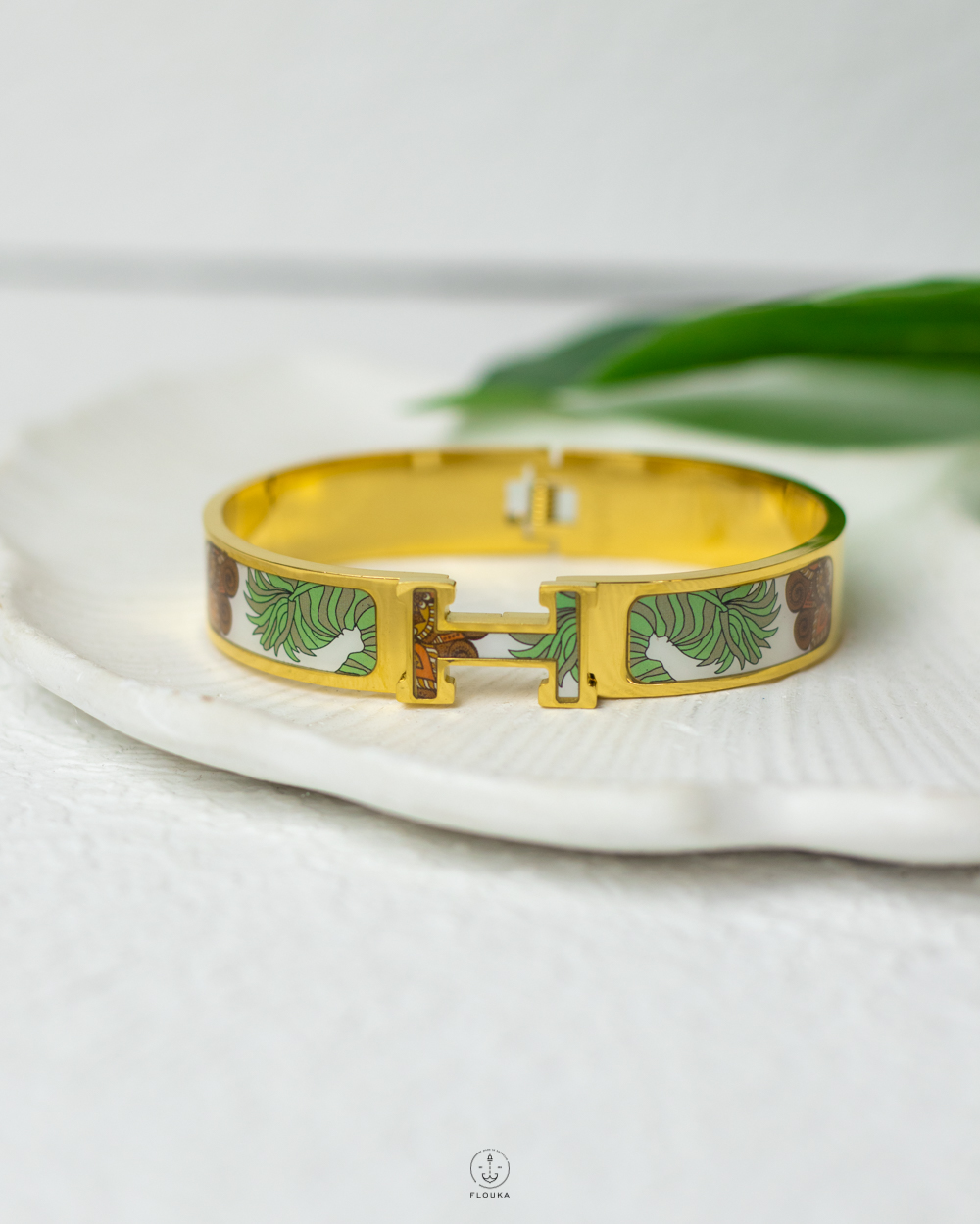 1762471040_o1013.jpg green hermes gold bracelet