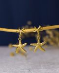 gold seastar earring