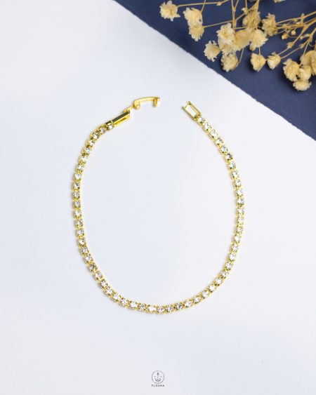 tiny gold tennis bracelet