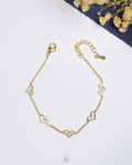 white rasin heart gold bracelet