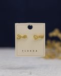 white struas tie gold earring