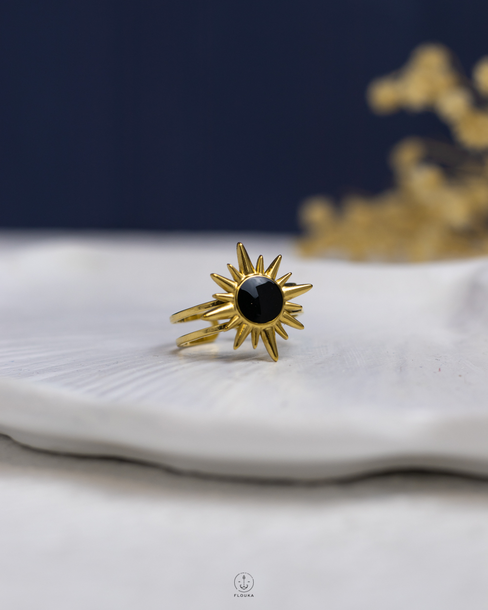 1763585852_r1105.jpg black rasin gold sun ring
