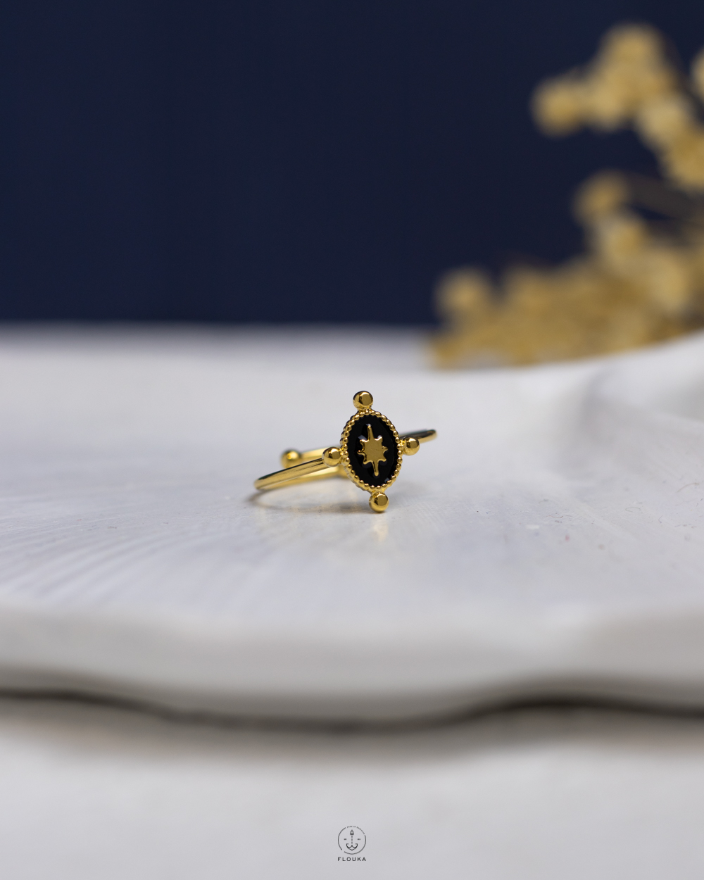 1763588009_r1095.jpg black rasin gold ring