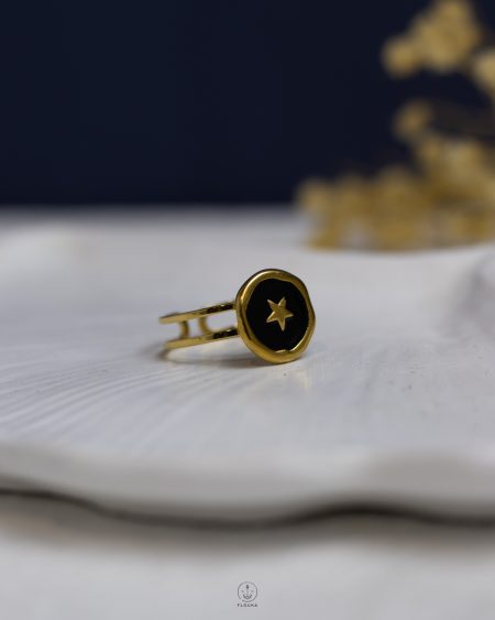 black rasin gold star ring