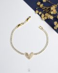 tiny gold heart tennis bracelet